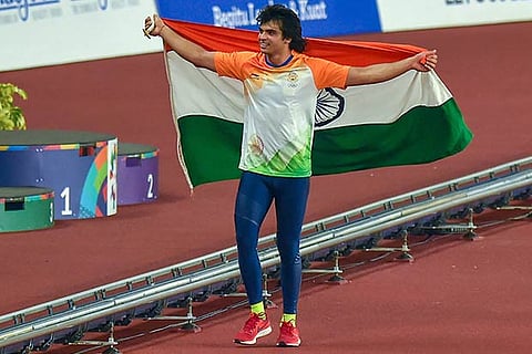 Neeraj Chopra celebrates after winning the Gold medal in men's javelin throw event