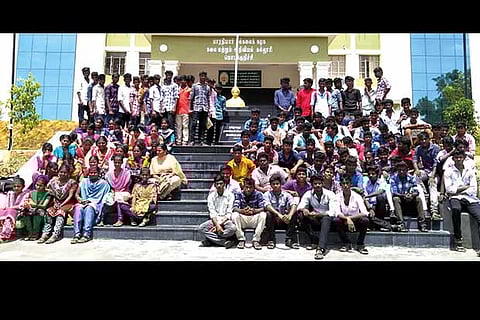 Students squatting in front of the Bharathiar University Arts and Science College in Erode