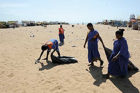 Corporation conservancy workers clock in extra hours to clean up the garbage