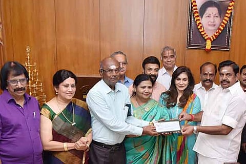 Indo Cine Appreciation Foundation members receive a cheque from CM Edappadi K Palaniswami