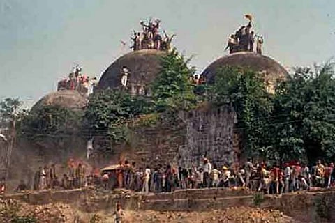 A file photo of Babri masjid being destroyed by the mob at Ayodhya