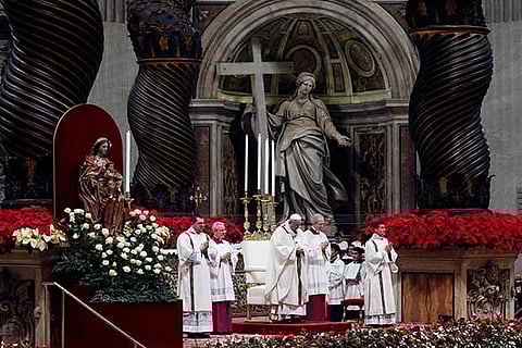 Pope Francis leads the Christmas Eve mass in Saint Peter's Basilica at the Vatican.