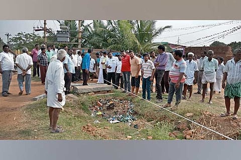 Officials surveying the land, where a ?Cross? was installed, at P Muthampatti on Friday