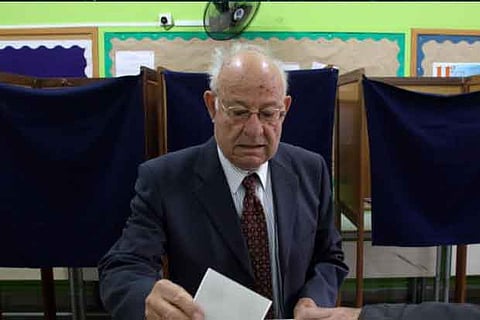 A man casts his ballot during the second round of the presidential election in Cyprus.Photo: Reuters