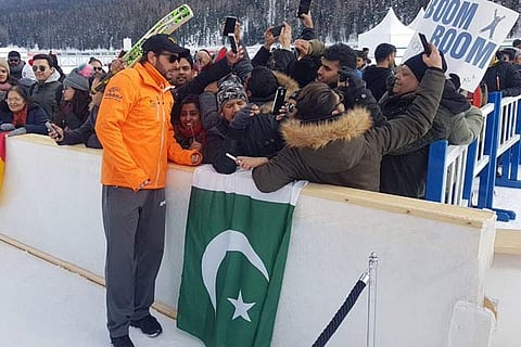 Former Pakistan skipper Shahid Afridi interacting with fans during St Moritz Ice Cricket Tournament