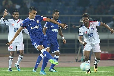 CFC?s Mailson Alves (left) strikes the ball in the ISL game against Delhi