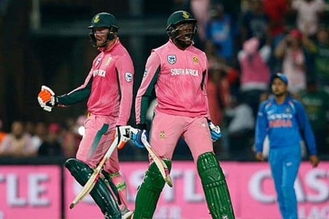 South Africa's Andile Phehlukwayo and Heinrich Klaasen celebrate their win in the 4th ODI