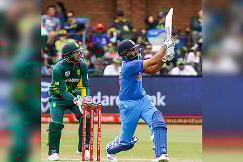 Rohit Sharma hits a shot during his knock of 115