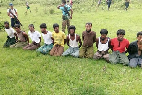 Ten Rohingya Muslim men with their hands bound in Inn Din village.(File Photo: Reuters)