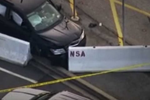 The black suv that crashed into a barricade.