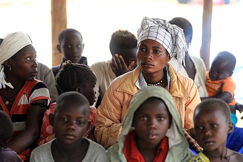 Congolese family, who migrated from Democratic Republic of Congo by fleeing on a boat