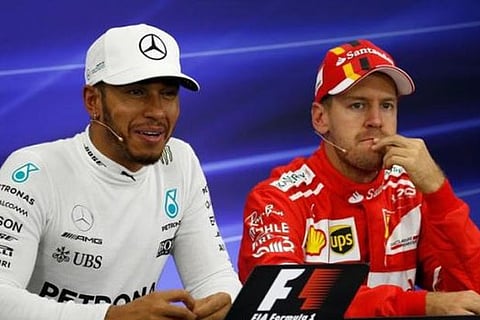 File photo of Lewis Hamilton and Sebastian Vettel