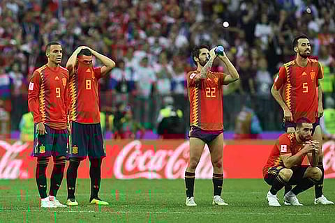 Favourite Spain exited in the round of 16 to host Russia on penalties