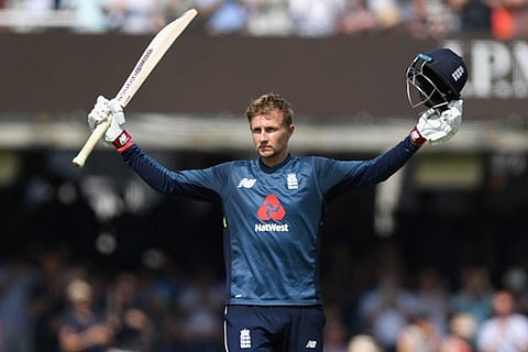 Joe Root celebrates his century