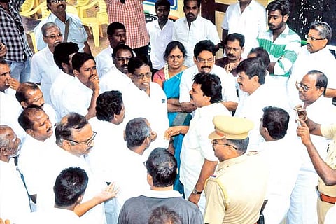 Fort Police pacifying two groups of Congress workers at the party?s district office in Tiruchy