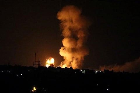 An explosion is seen following an Israeli air strike in the southern Gaza