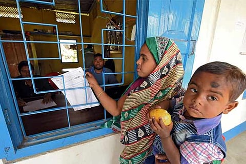 India vows justice as many Muslims fear being left off citizen list