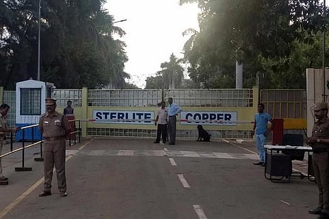 Police stand guard outside a copper smelter controlled by London-listed Vedanta in Thoothukudi