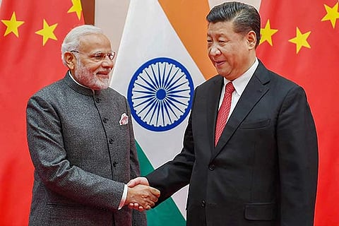 PM Narendra Modi meeting the Chinese President Xi Jinping