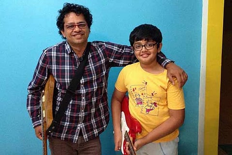 Gokul with his guru Guitar Prasanna