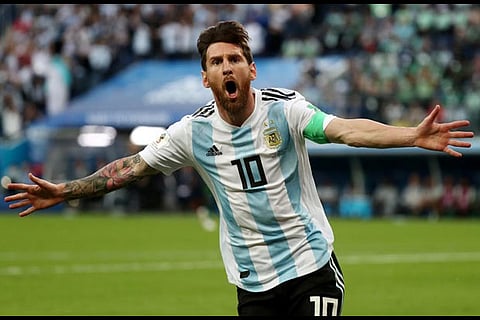 Argentina's Lionel Messi celebrates scoring their first goal
