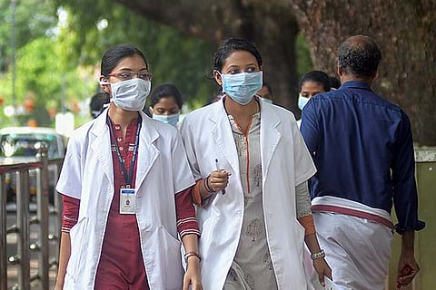 File photo of doctors wearing safety masks during the Nipah virus outbreak