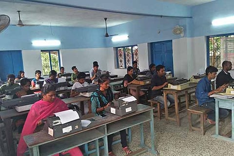 Students at a typewriting school in the city