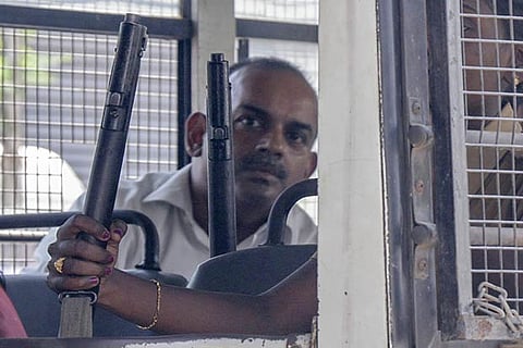 Subhiksha retail chain founder R Subramanian being escorted to Allikulam court