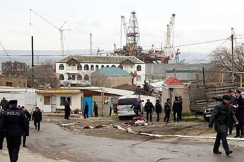 Police officers cordoned off the drug rehabilitation clinic in Azerbaijan.(AFP)