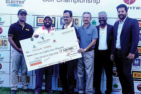 Mithun Perera (second from left) receives the cheque