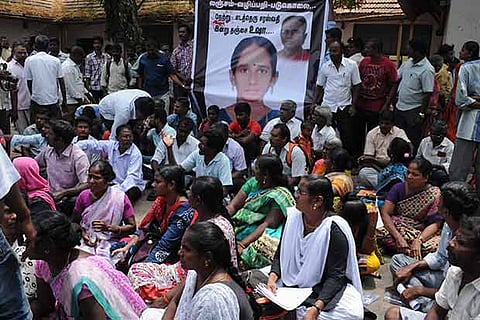 Usha?s relatives, activists protest demanding that the inspector be booked for murder