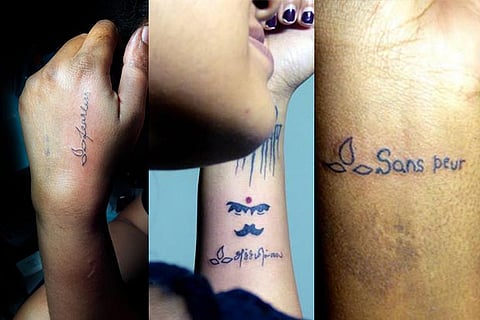 Tattoos inked in various languages include French (Sans Peur) and Tamil (Acham Illai)