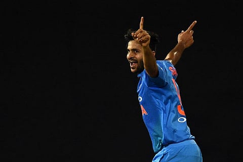 Shardul Thakur celebrates taking a wicket