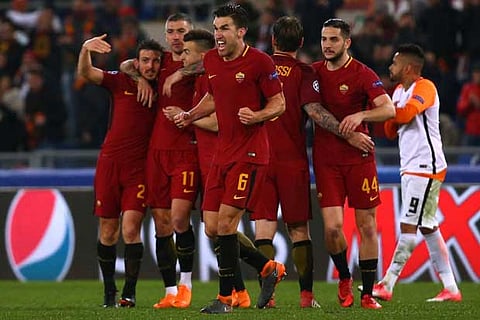 Roma's Kevin Strootman celebrates after the match