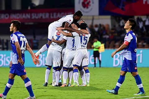 Chennaiyin FC Raphael Augusto celebrates with his teammates after scoring against Bengaluru FC
