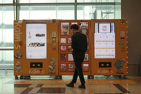 Struggling Singapore retailers turn to vending machines