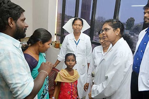 Janani with her parents and doctors at Vellore GMCH