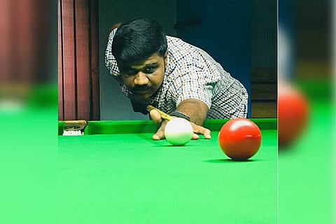 Madhan in action during the YMCA Madras Open Snooker Championship