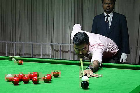 Madhur plays a shot during his match against Harshad on Wednesday