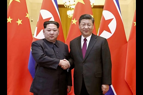Xi Jinping and Kim Jong-un