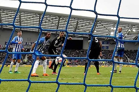 Two late goals helped Leicester City earn a 2-0 victory at Brighton and Hove Albion