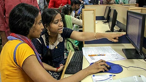 Students enrol online for Tamil Nadu Engineering Admission at a Centre
