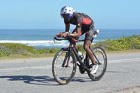 Raghul cycling at the triathlon