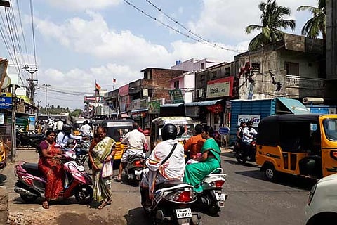 Motorists ply on the narrow Pallavaram - Kundrathur road