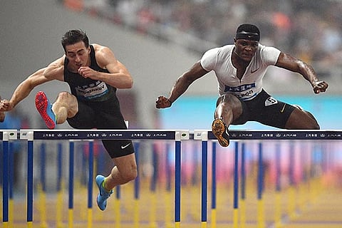 Jamaica's Omar McLeod (right) in action