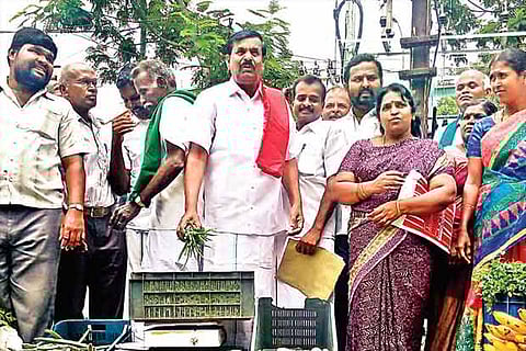 armers sell vegetables in front of the Collectorate in Coimbatore on Monday
