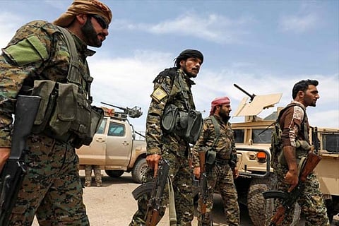 At least 26 Syrian regime forces and nine Russian fighters were killed in an IS group attack