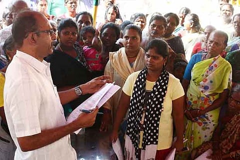 Advocate Commissioner along with the residents in Perumbakkam in Chennai on Sunday