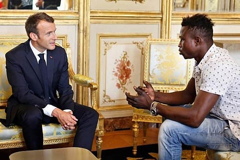 Mamoudou Gassama is honored by Macron for scaling an apartment building to save a 4-year-old child
