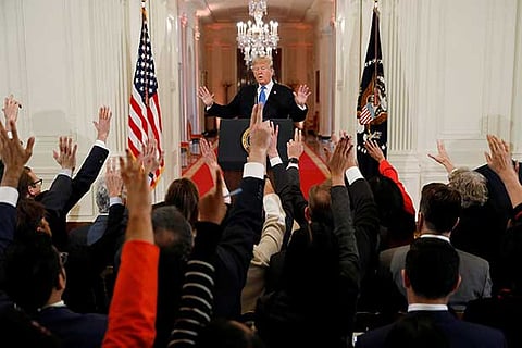 US President Donald Trump taking questions from the press
